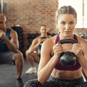 The 5 Biggest Gym Myths Debunked: What You Need to Know 2 Women exercising with kettlebells, exercise